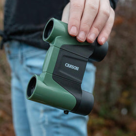 Carson Wild Cat held in hand to show scale and lightweight portability