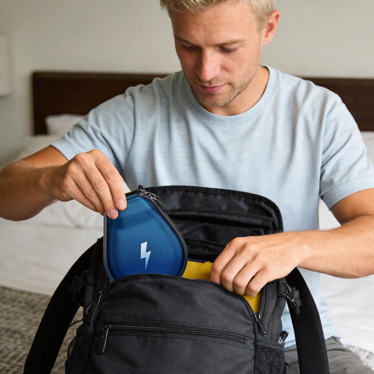 casmilee case clipped to runner's belt in a lifestyle outdoor scene