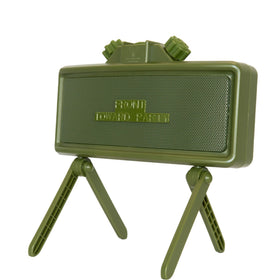 Catastrophic Industries Claymore speaker on beach delivers rugged waterproof sound for outdoor listening.