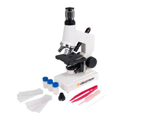 Celestron 44121 microscope kit contents with slides and tools for beginners.