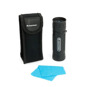 Celestron UpClose G2 monocular stored in soft case for travel protection.