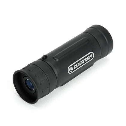 Celestron UpClose G2 monocular in hand, compact design for travel and quick viewing.