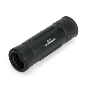 Celestron UpClose G2 monocular in use with a stable grip for precise focusing.