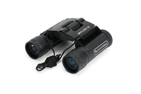 Celestron UpClose G2 8x21 binoculars, side view; rugged rubber armor for field use.