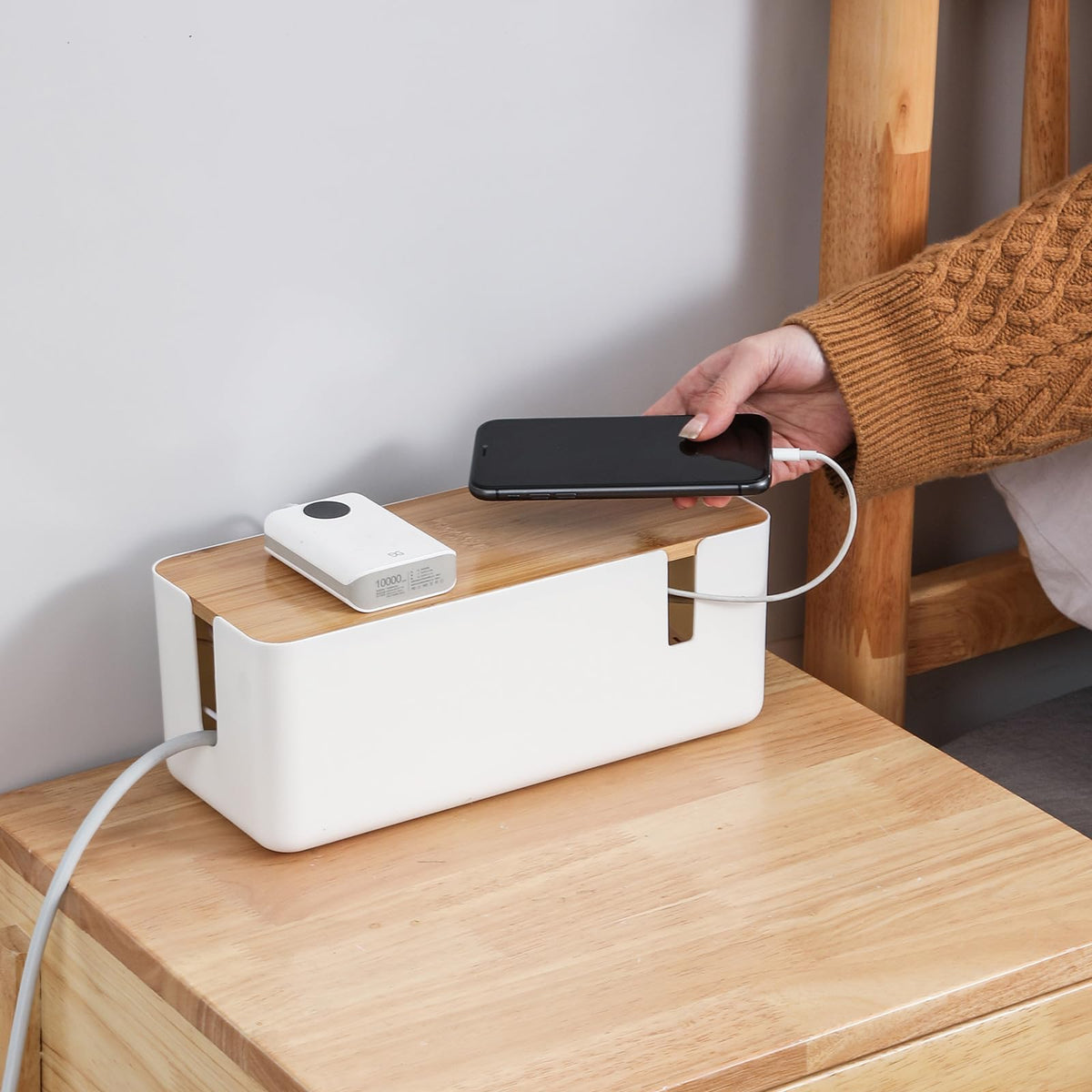 Changsuo floor-use box hides cables behind furniture.