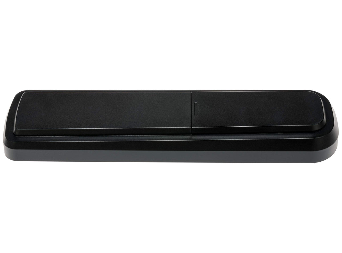 Channel Master Simple Remote illustrating volume and power control in use