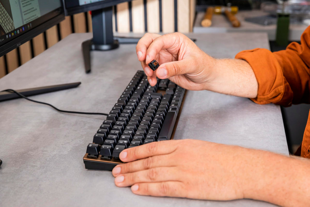 Cherry KC 200 MX compact layout saves desk space for busy work days.