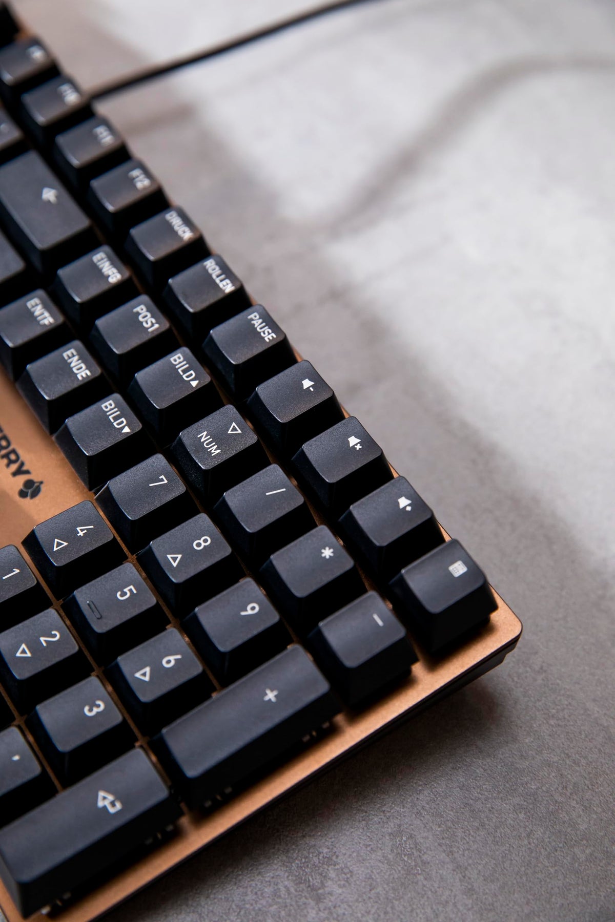 Cherry KC 200 MX top view highlighting slim profile ideal for compact desks.