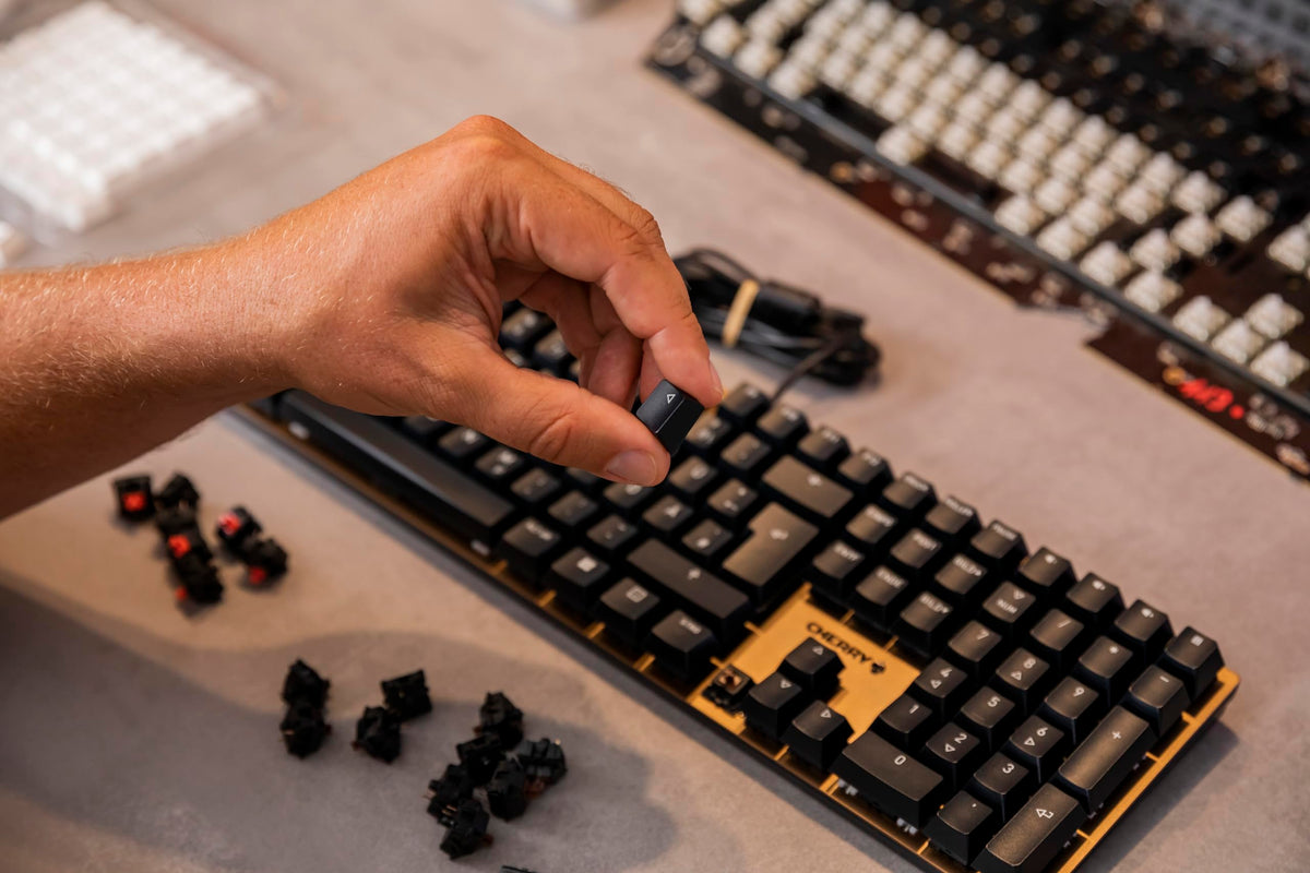 Cherry KC 200 MX brown switches close-up showing tactile feedback for precise typing.