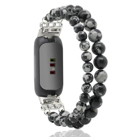 C&L Accessories Snowflack Obsidian beaded bracelet worn on the wrist for versatile styling.