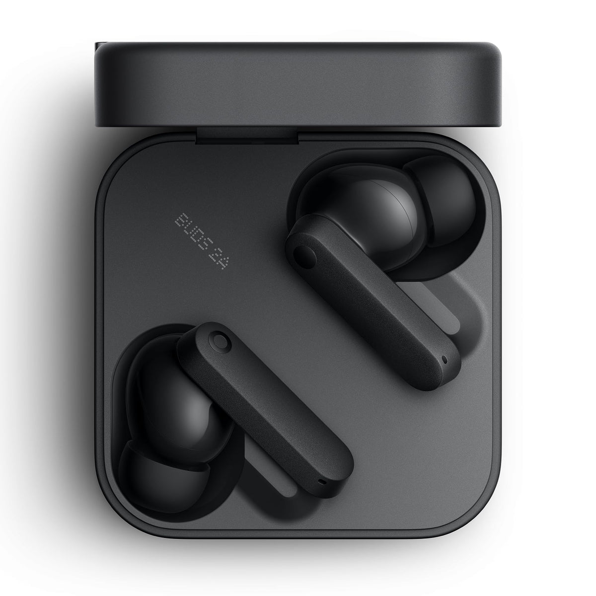 CMF BY NOTHING earbuds on desk in dark grey lifestyle scene showing stylish everyday use