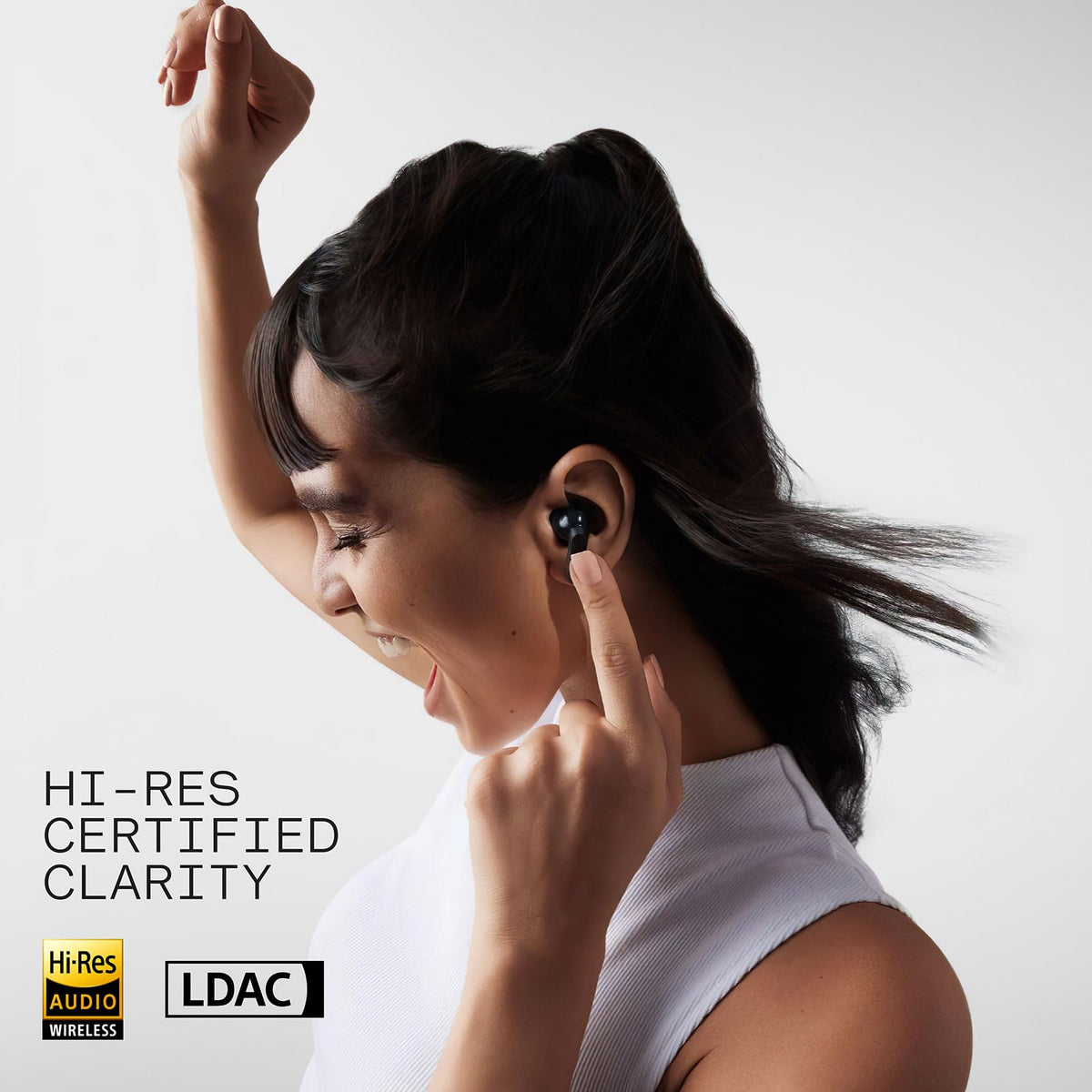 CMF BY NOTHING earbuds worn in-ear demonstrating secure fit for active use