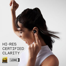 CMF BY NOTHING earbuds splashed with water to show IP54 resistance and active‑use durability