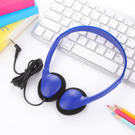 CN-Outlet headphones beside ruler to show compact size and portability