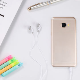 CN-Outlet earbuds in hand for size and scale reference before distribution