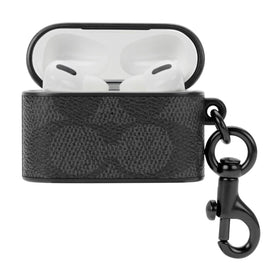 Coach packaging and warranty card showing premium presentation and coverage