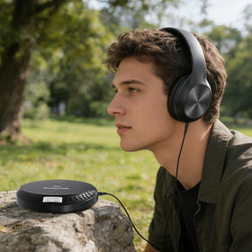Coby player with CD and MP3 disc showing multi-format playback benefit