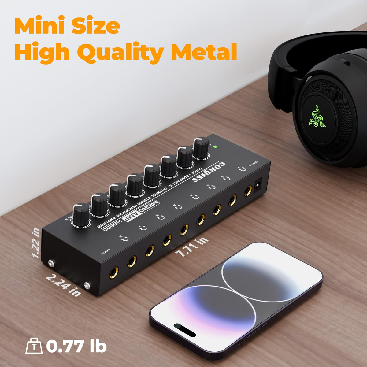 COKYISS beside a pair of headphones to show compact size and plug-and-play convenience