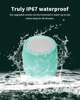 IPX7-rated shell protects against rain and splashes during outdoor showers.