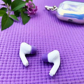 COMPLY tips installed on AirPods Pro demonstrating secure fit benefit