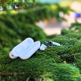 COMPLY lifestyle shot of runner wearing AirPods Pro with tips, demonstrating stability benefit