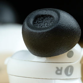 TechDefender-equipped COMPLY tips shielding earbuds from wax and moisture