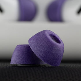 COMPLY earbuds with TrueGrip MAX while running to show sweat resistance