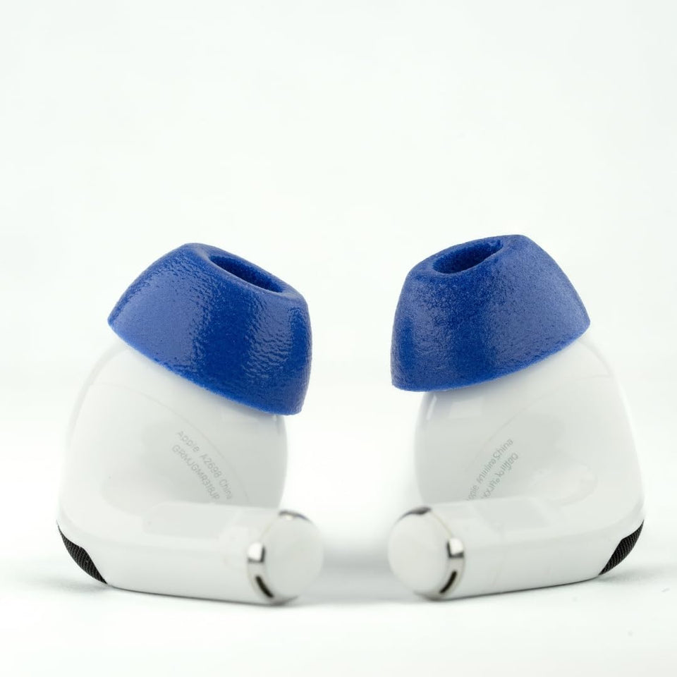 Comply TrueGrip MAX blue large ear tip closeup showing memory foam seal for AirPods Pro.