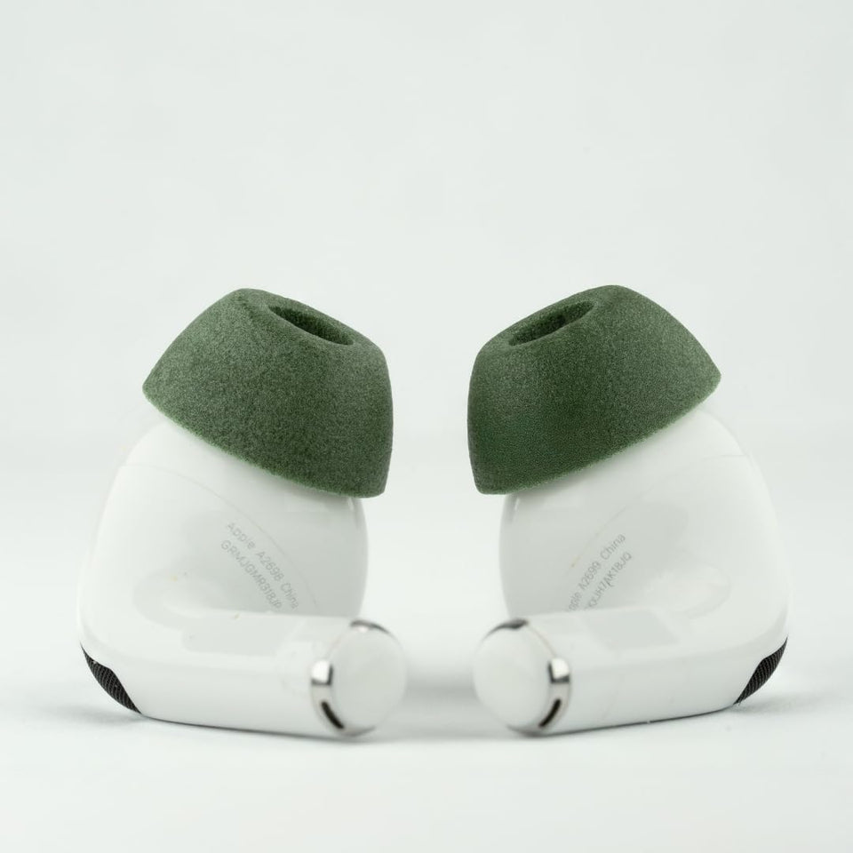 COMPLY TrueGrip MAX ear tips in green medium packaging for AirPods Pro durability.