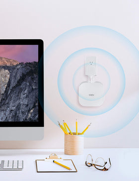 COOLWUFAN held in hand next to eero showing compact size and portability