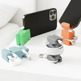 CordBrick front packaging showing four assorted weighted cord holders for easy access