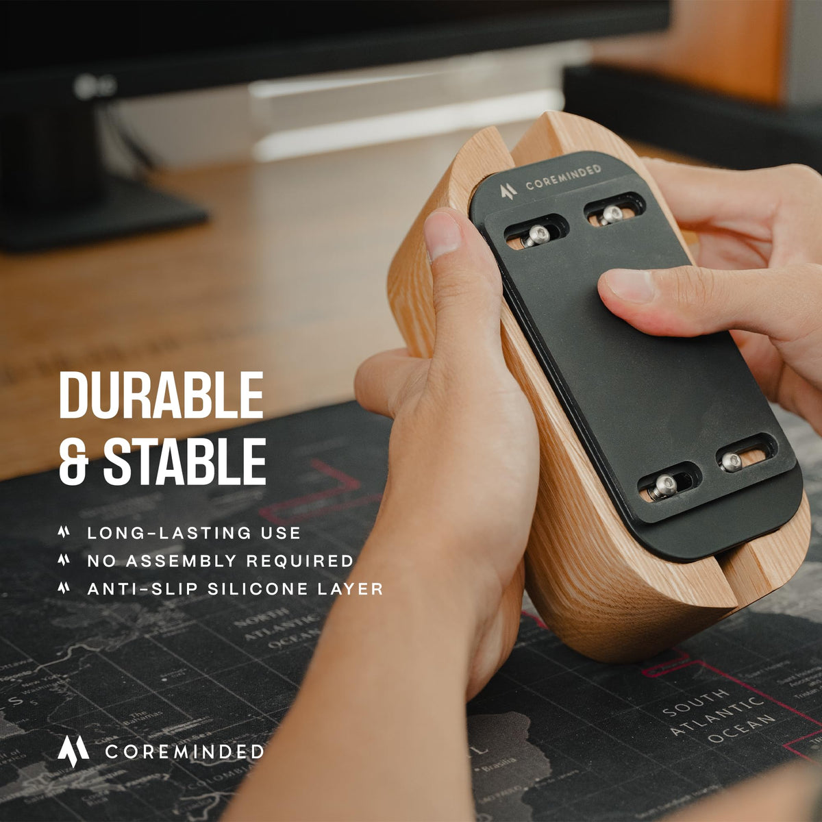 COREMINDED lifestyle desktop setup blending wood stand with monitor