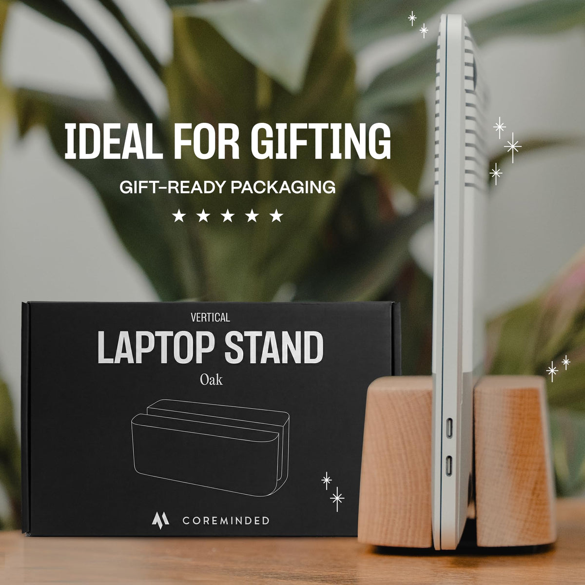 COREMINDED size comparison with notebook illustrates compact footprint