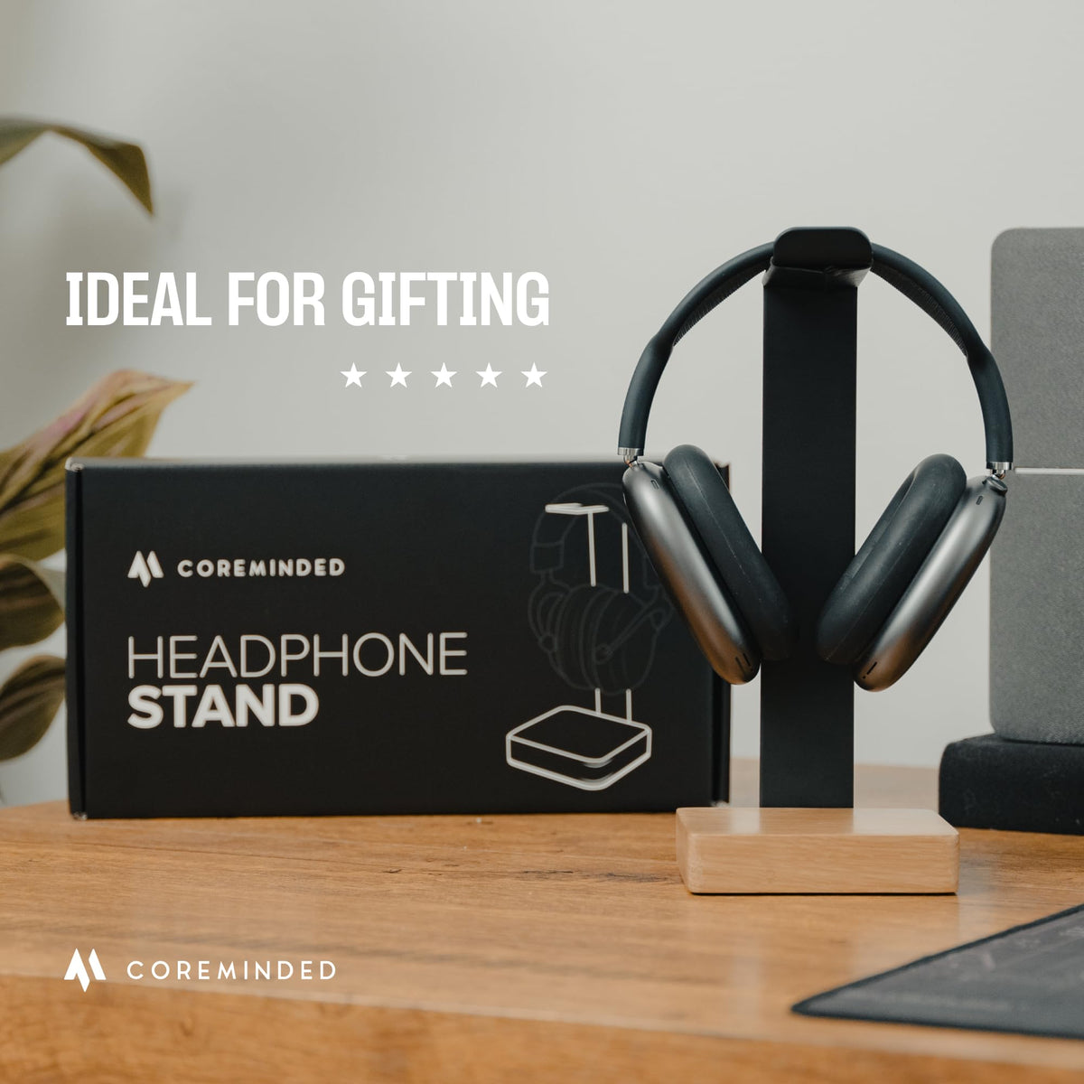 COREMINDED headphone stand with a metal rod provides stable, durable support.