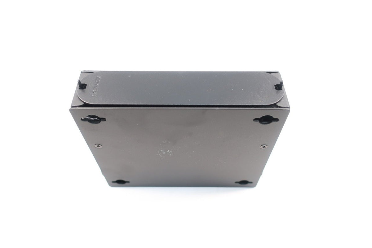 Corning SPH-01P mounted on wall showing space-saving benefit