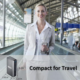 COSCTOR next to a laptop showing scale and high‑watt laptop compatibility