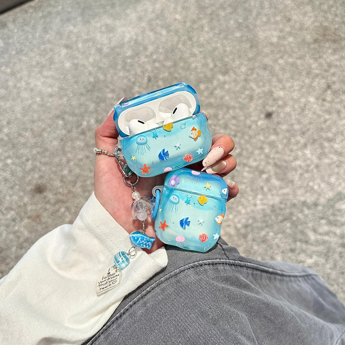 COTYPOFLIYTT case clipped to backpack showing portable protection benefit