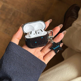 COTYPOFLIYTT star-pattern-keychain attaches to bag or keys.