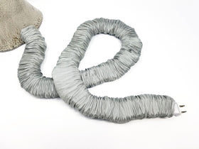 COVER EASE DECORATIVE CORD COVERS close-up of faux silk texture adds elegant finish