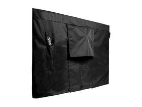 Covermates outdoor TV cover on a mounted TV protects against rain and sun while keeping connections accessible.
