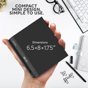 Craig compact player next to hand for scale, showing portable small-footprint benefit