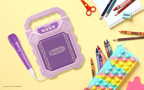 Crayola Mini Karaoke kids using it at a party for singing fun