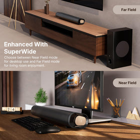 Creative Stage Pro beside a TV in a compact home setup