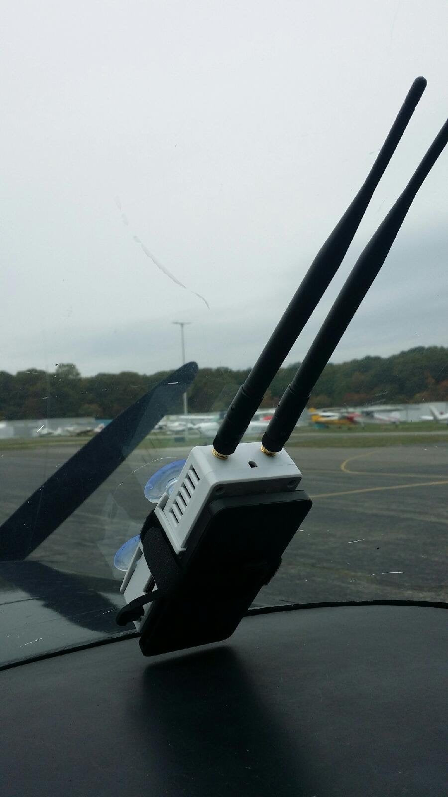 Crew Dog Stratux suction mount secures the unit to a window for easy mounting