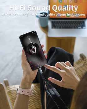 Criello USB-C to 3.5mm adapter in use while charging and listening.