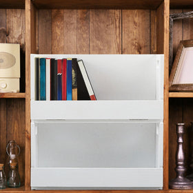 CroBlissful storage box placed on a desk to organize media.