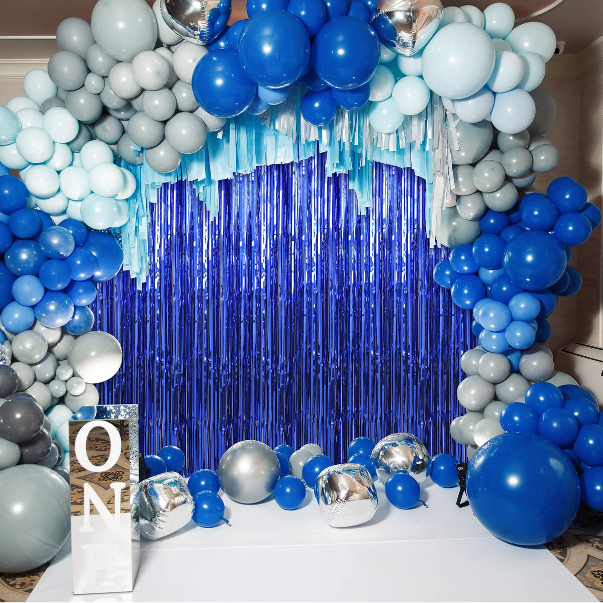 Crosize used as a photo booth backdrop with balloons offering picture-ready background benefit