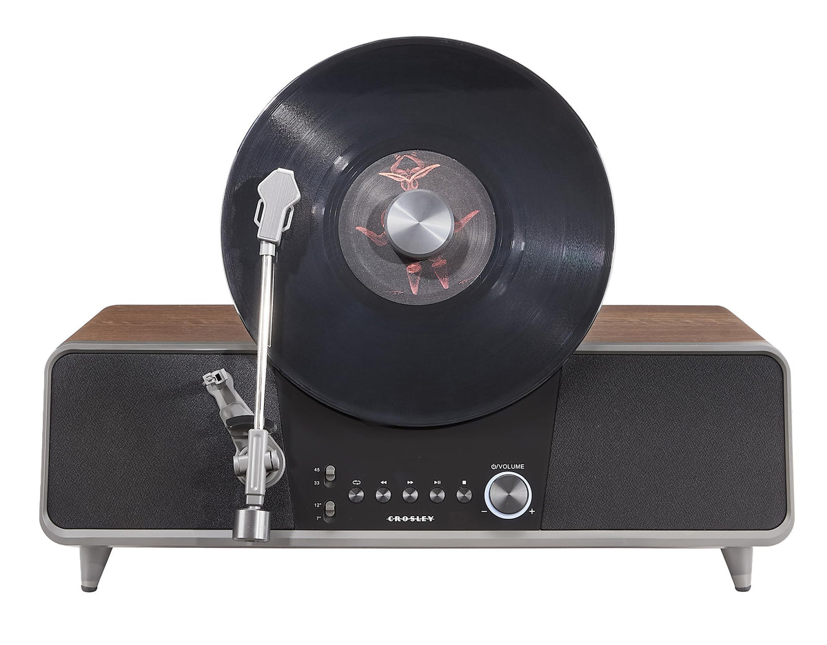 Crosley Beck vertical turntable in walnut, space-saving design for compact rooms