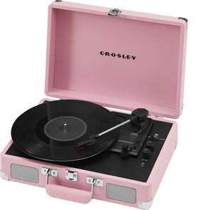 Crosley Cruiser Plus blush open lid reveals easy cueing and playback access