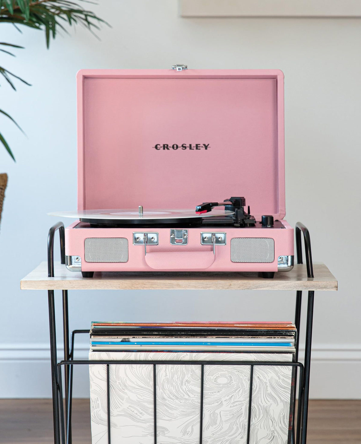 Crosley Cruiser Plus blush top-down view highlights portable suitcase design
